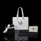 Von Baer gift packaging with leather belts and certificate.