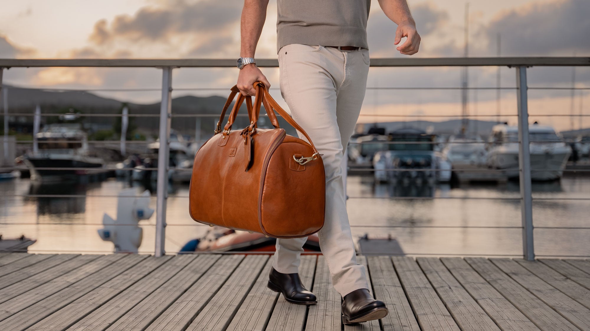 Von Baer Grand Large Full-Grain Leather Garment Travel Bag (Tan, Model Walking, Sunset)