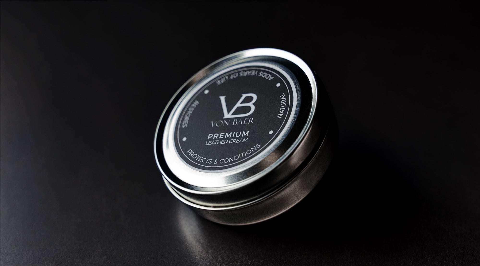 A container of Von Baer handmade natural leather cream for protecting and removing scratches.
