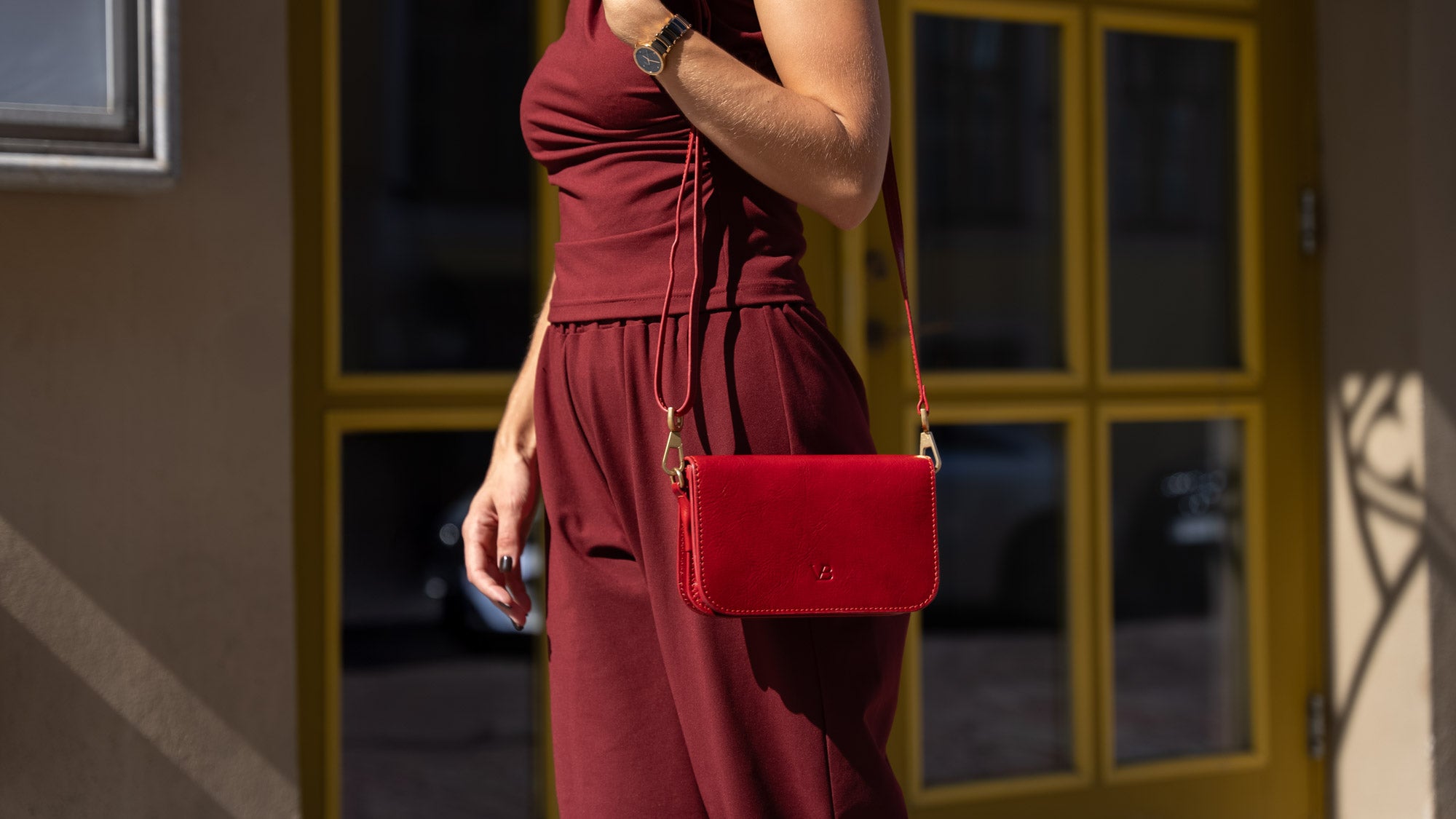 A red Von Baer Isabella leather women's handbag.