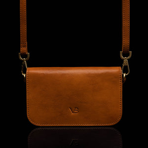 Von Baer Isabella luxury small leather shoulder bag with adjustable strap in tan, front view.