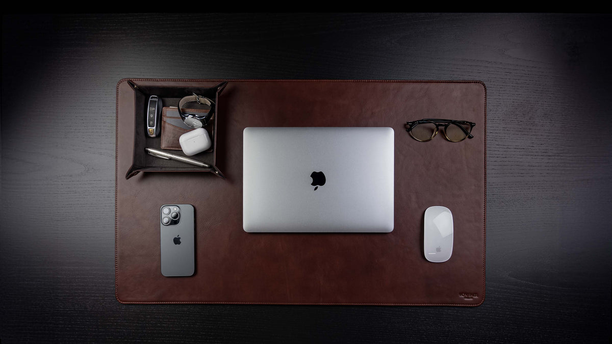 Von Baer large luxury leather desk mat in high-quality brown, featuring an upper view with a MacBook placed as a stylish gift idea.