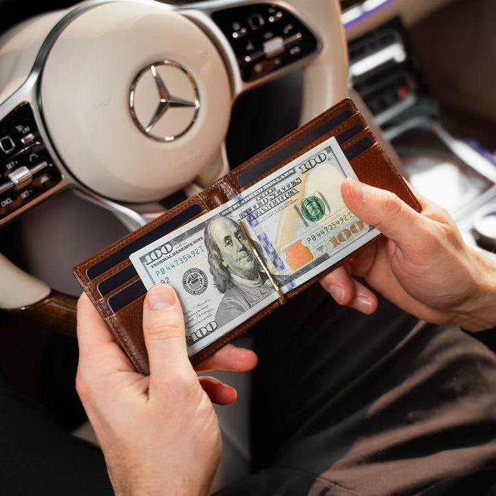 von baer leather money clip small mens wallet solid brown rich man holding in hands