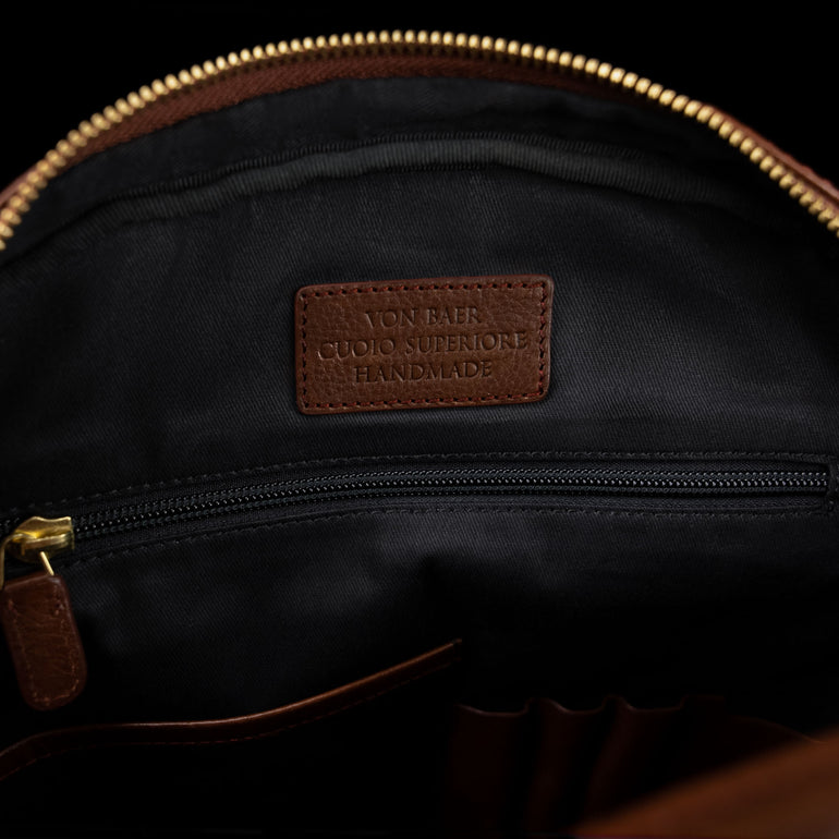 Von Baer Liberty handmade women's leather backpack with cotton lining, showcasing the quality craftsmanship and functional design.