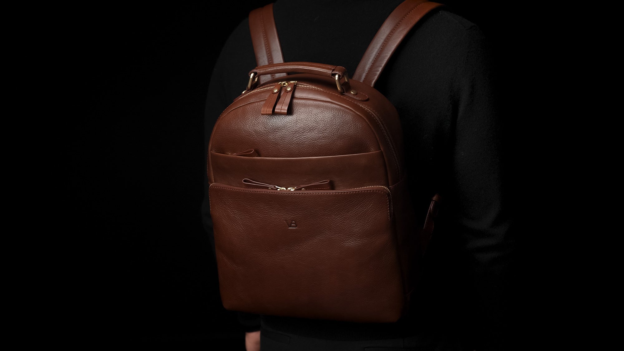 Von Baer Liberty stylish women's full-grain brown leather backpack on male model slider 2