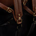 Von Baer Liberty women's full grain leather backpack with brass details, close-up.