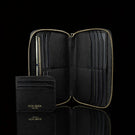Luxury men’s leather wallet with RFID protection, 2-in-1 cardholder front view on a black background