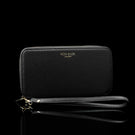 Von Baer origin luxury RFID men’s leather wallet in cognac tan with wrist strap, detailed view showing premium craftsmanship.
