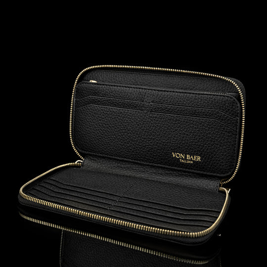 Von Baer origin large men’s leather zip wallet in black, interior view showing organized compartments and slots for cards and cash.
