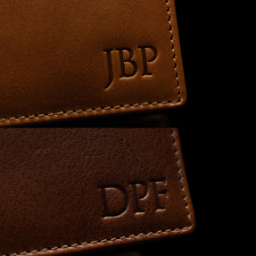 Von Baer Tallinn example of initials embossing on the leather wallets.