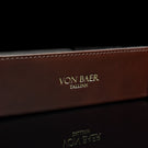 Von Baer Tallinn Majestic luxury Italian leather tray desk organizer, catch-all in brown, showcasing the golden logo close-up, exuding elegance and sophistication.