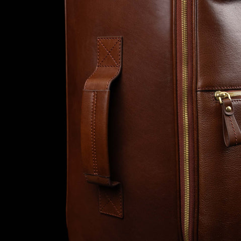 Side handle detail on the brown Von Baer Voyager women's luxury leather carry on trolley bag