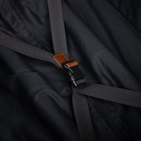 Close-up of the packing straps inside the brown Von Baer Voyager women's luxury leather carry on bag