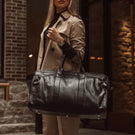 Weekender Womens Leather Weekend Bag elegant black with model
