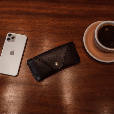 deluxe leather glasses case black iphone lifestyle