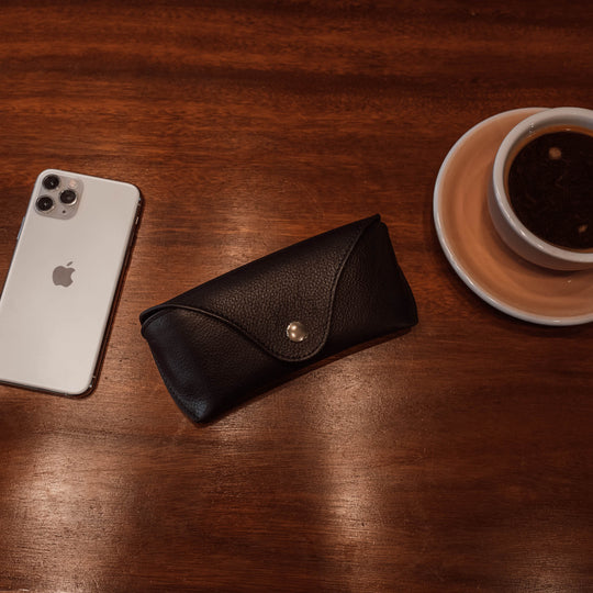deluxe leather glasses case black iphone lifestyle