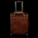 voyager leather carry on bag with wheels solid brown back view with wheels drawer out